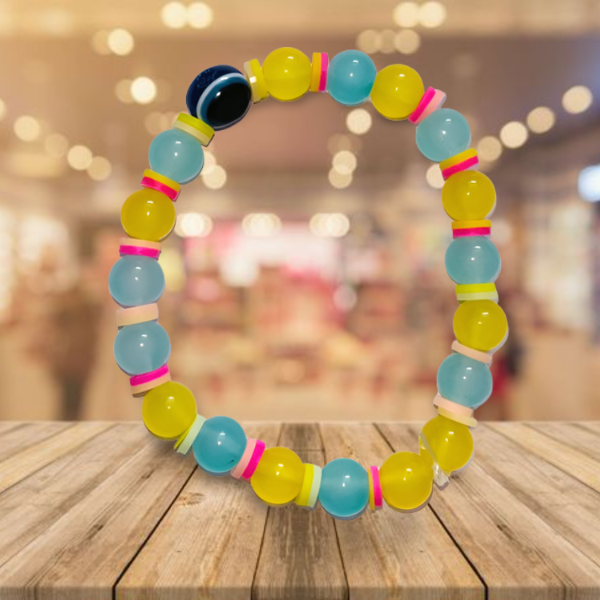 Bracelet with Sky Blue and Yellow combination with a Deep Blue Stone