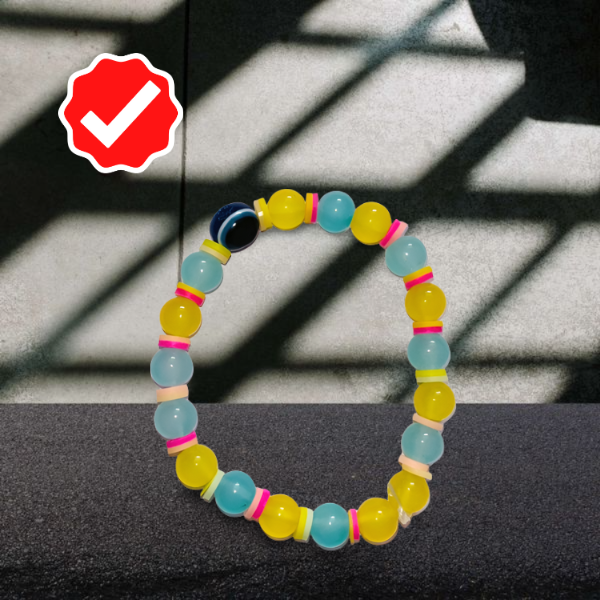 Bracelet with Sky Blue and Yellow combination with a Deep Blue Stone